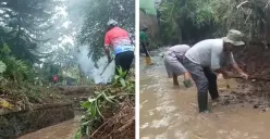 Ketua RT 02 dan warga membersihkan tumbuhan liar dan semak semak di aliran sungai. (Foto: Jumali indrayanto)