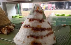 Awug khas Sunda tersaji hangat dalam bentuk kerucut berlapis gula merah. (Sumber: Dokumentasi Penulis| Foto: Jajang Shofar Khoerudin)