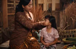 Wanita Indonesia memakai kebaya. (Sumber: Pexels | Foto: David Tumpal)
