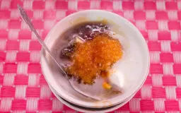Asal Usul dan Perkembangan Ampiang Dadiah: Tradisi Kuliner Minangkabau dari Masa ke Masa